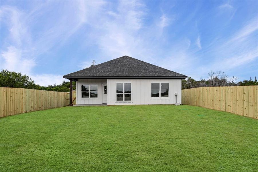 Exterior details and patio area of a home in , Granbury (Image 23).