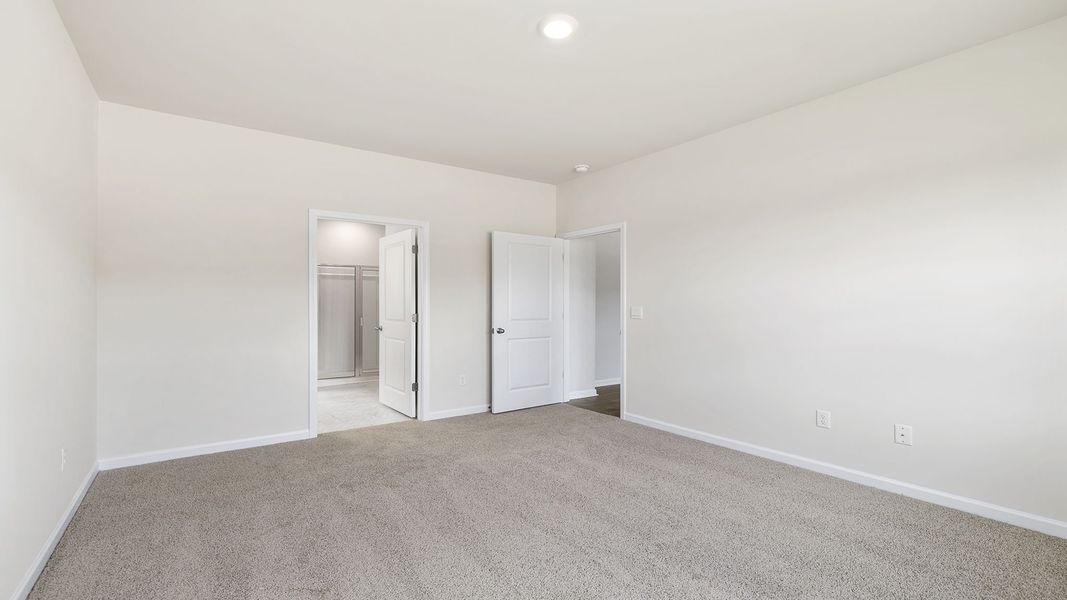 Spacious, unfurnished interior of a new home in Durbin Meadows Traditions, Fountain Inn (Image 23).