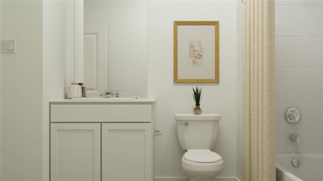 Full bathroom featuring shower / bath combo, vanity, and toilet