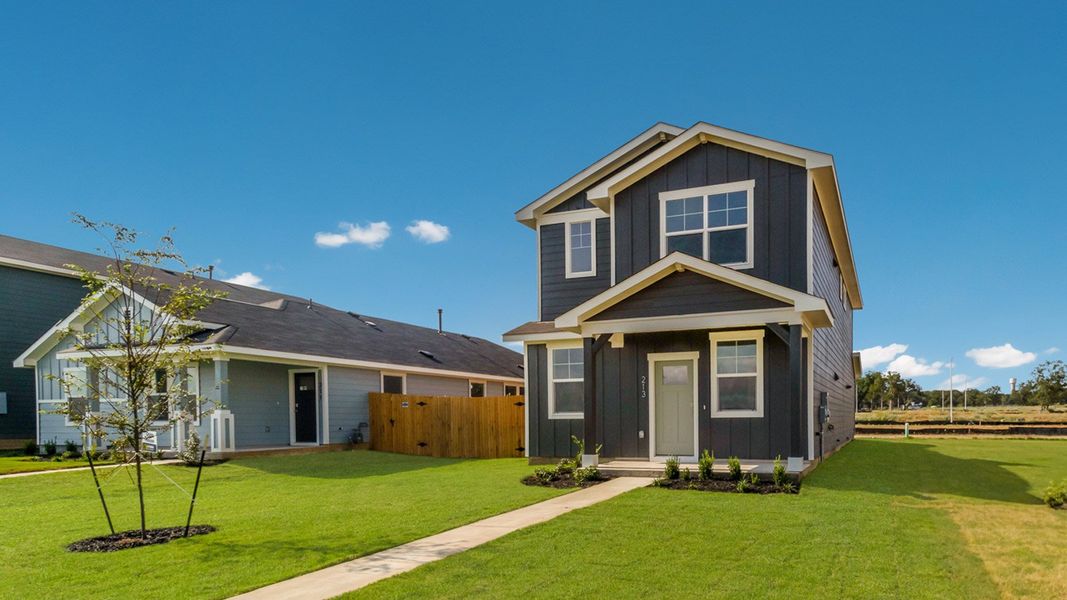 Representative exterior photo of a completed home built from the The Buchanan by D.R. Horton in Valverde, Bastrop, TX (Image 4).