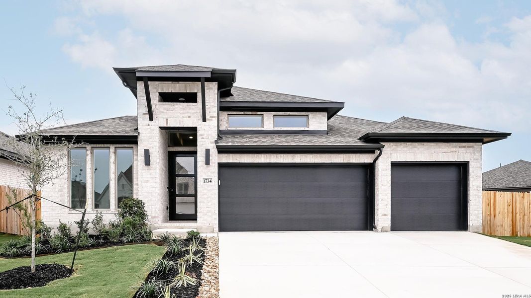 Front exterior of a new home in Meadows of Mill Creek, Seguin, TX, highlighting curb appeal (Image 2). Front exterior of a new home in Meadows of Mill Creek, Seguin, TX, highlighting curb appeal (Image 2).