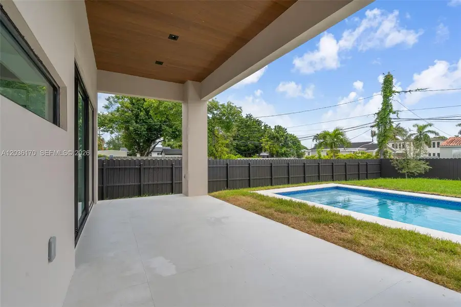 Exterior details and patio area of a home in , Miami (Image 4). Exterior details and patio area of a home in , Miami (Image 4).