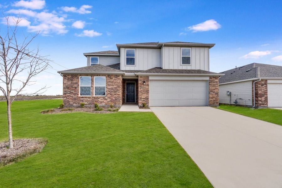 Representative exterior photo of a completed home built from the Starboard by Taylor Morrison in River Ridge, Crandall, TX (Image 1).