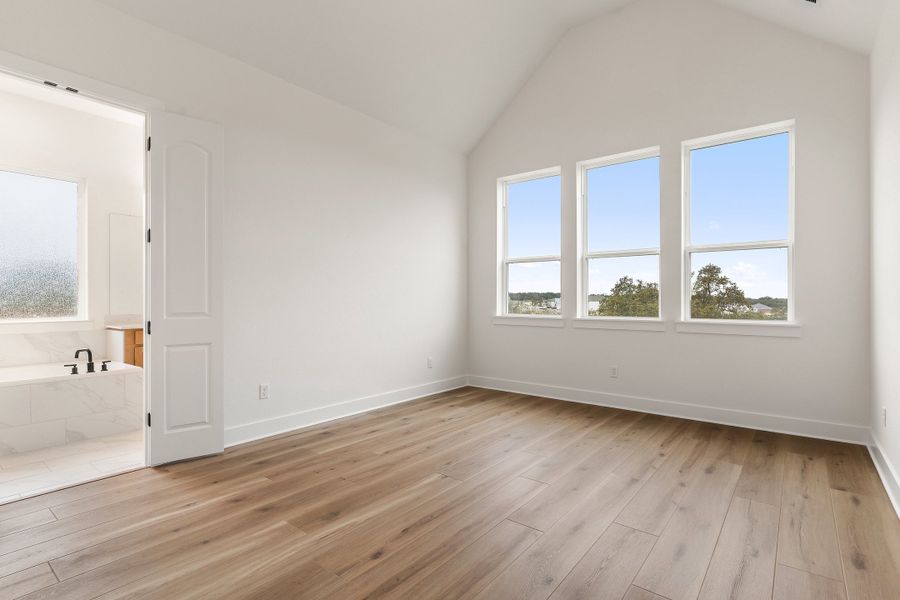 Representative unfurnished interior of a home built from the Waterville by Ashton Woods in The Trails at Carmel, Pflugerville (Image 48).