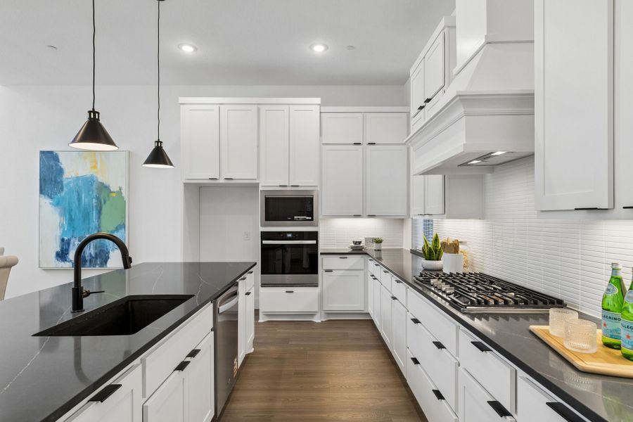 Representative furnished interior of a home built from the Roosevelt by Centre Living Homes in Newman Village Townhomes, Frisco (Image 11).