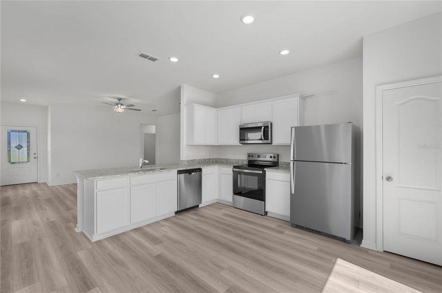 Furnished interior view inside a new home in Gum Lake Preserve, Lake Alfred (Image 6).