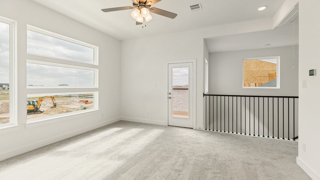 Representative furnished interior of a home built from the Valencia by Brightland Homes in Bridgeland Central, Cypress (Image 21).