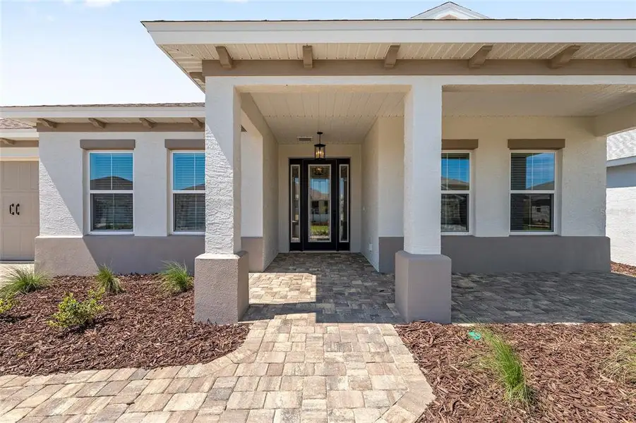 Exterior details and patio area of a home in , Ocala (Image 32).