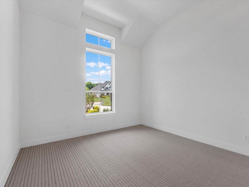 Spacious, unfurnished interior of a new home in The Estates at James Lane, Fulshear (Image 24).