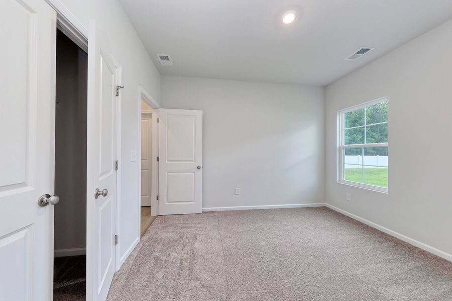 Spacious, unfurnished interior of a new home in Hainer Place, Conway (Image 28).