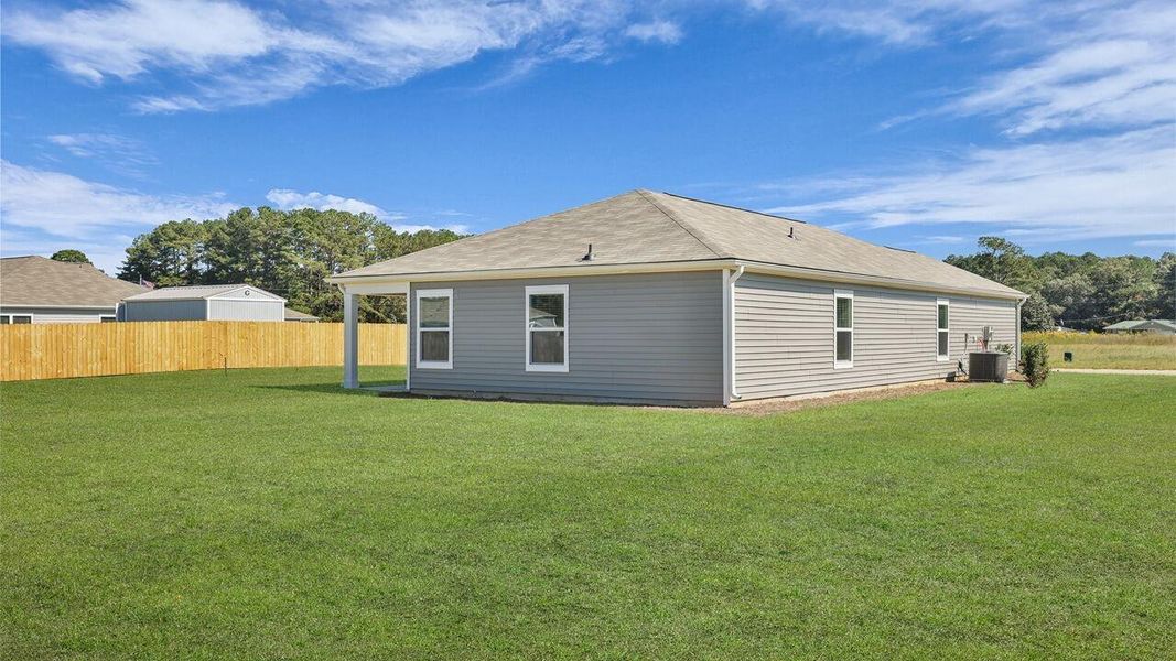 Exterior details and patio area of a home in Evergreen, Holly Hill (Image 15).