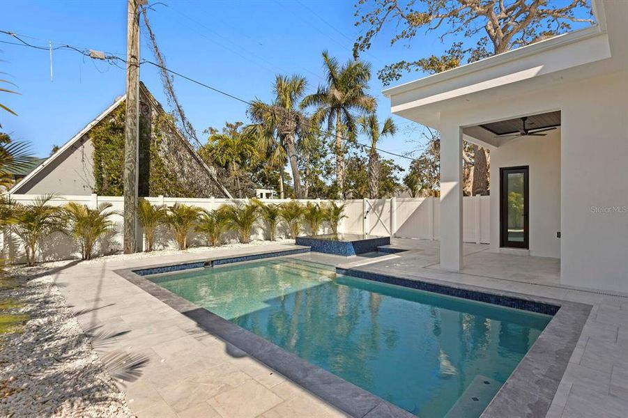 Exterior details and patio area of a home in , Sarasota (Image 29).