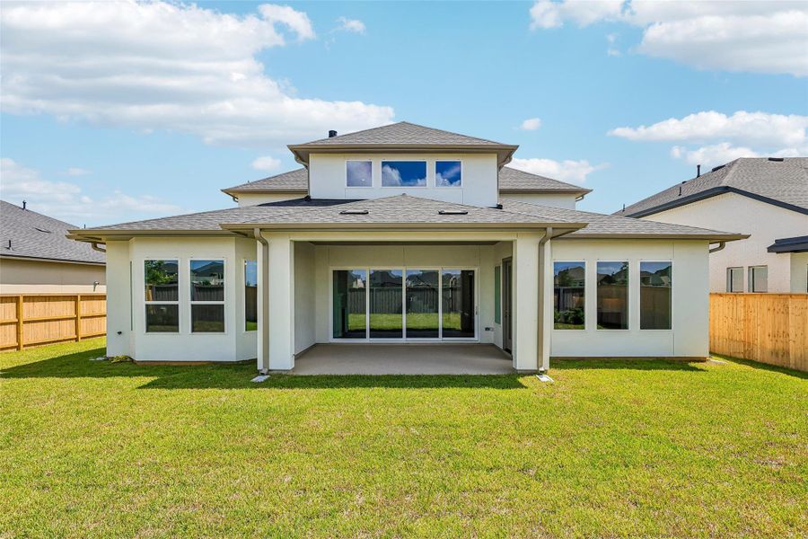 Exterior details and patio area of a home in The Grand Prairie 60', Hockley (Image 2). Exterior details and patio area of a home in The Grand Prairie 60', Hockley (Image 2).