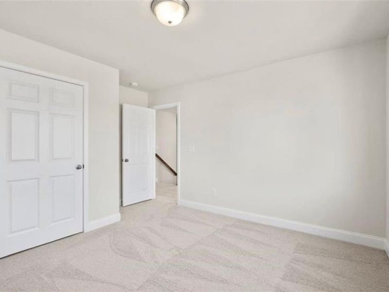 Spacious, unfurnished interior of a new home in Wehunt Meadows, Hoschton (Image 36).