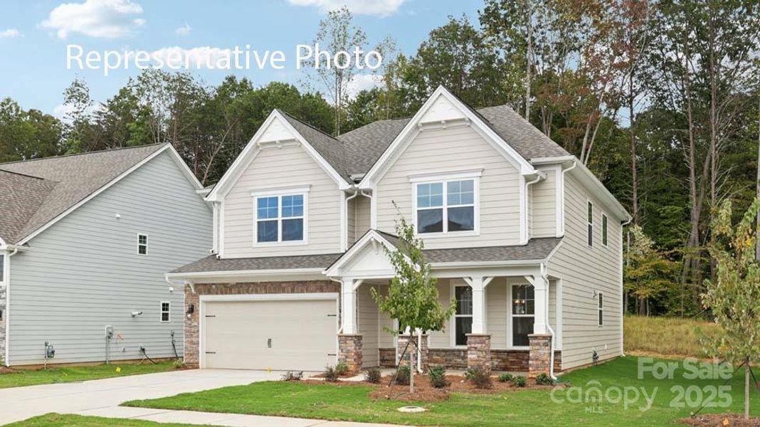 Front exterior of a new home in Sanctuary at Southgate, Indian Trail, NC, highlighting curb appeal (Image 2). Front exterior of a new home in Sanctuary at Southgate, Indian Trail, NC, highlighting curb appeal (Image 2).