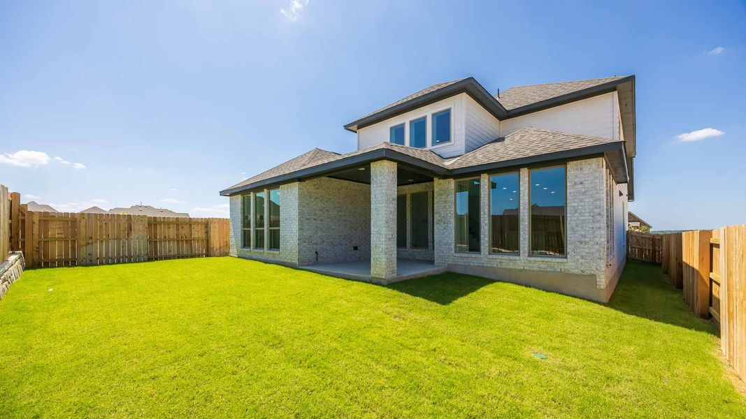 Exterior details and patio area of a home in Lariat 50', Liberty Hill (Image 3). Exterior details and patio area of a home in Lariat 50', Liberty Hill (Image 3).