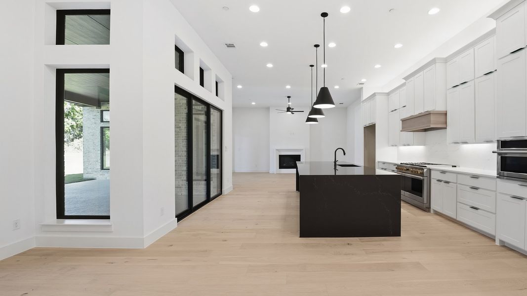Furnished interior view inside a new home in Enchanted Creek, Lucas (Image 12).