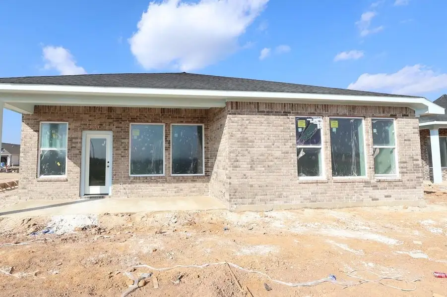 In-progress construction of a new home in The Grand Prairie 50’, Hockley, TX (Image 4).