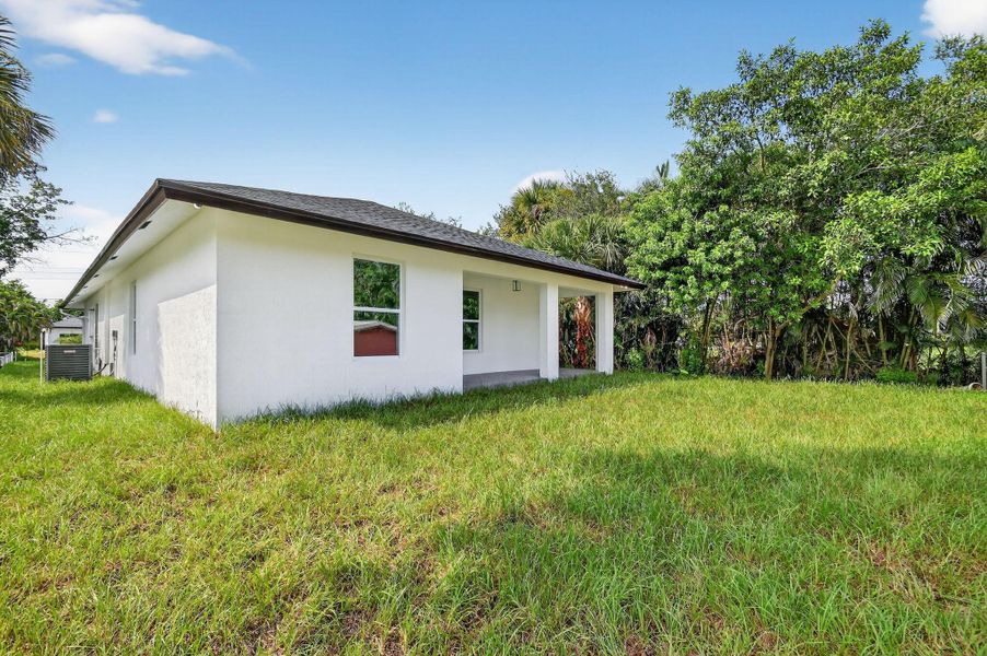 Front exterior of a new home in , West Palm Beach, FL, highlighting curb appeal (Image 16).