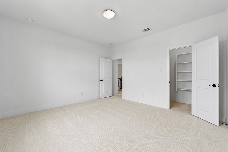 Representative unfurnished interior of a home built from the Ellis by Landon Homes in Fields - East Village, Frisco (Image 22).