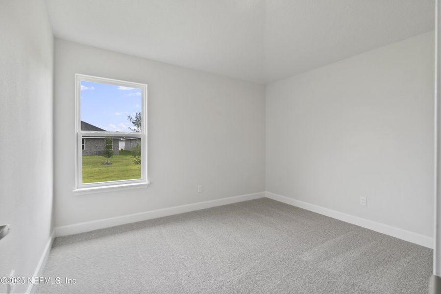 Spacious, unfurnished interior of a new home in Shadow Crest at Rolling Hills, Green Cove Springs (Image 17).