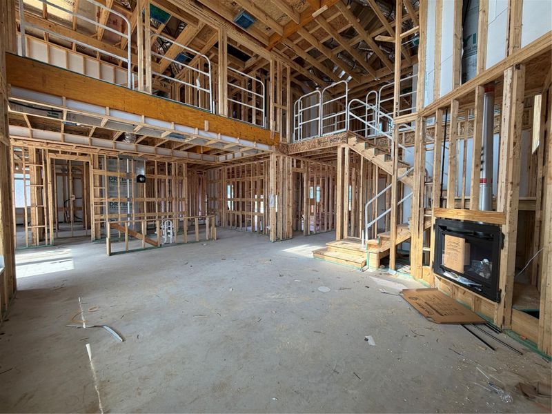Family Room with soaring ceiling & fireplace Family Room with soaring ceiling & fireplace
