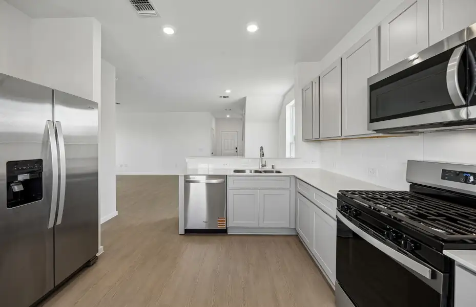 Furnished interior view inside a new home in Windcress, Cove (Image 12).