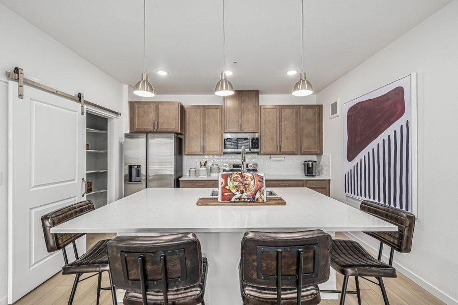 Furnished interior view inside a new home in The Residences at Victory Ridge, Colorado Springs (Image 5).