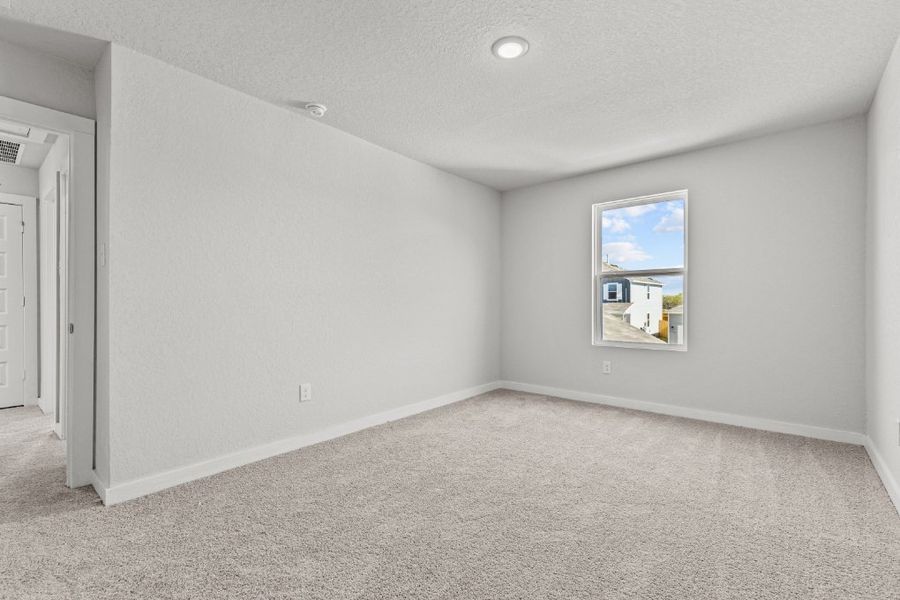 A room with a painting on the wall. A room with a painting on the wall.
