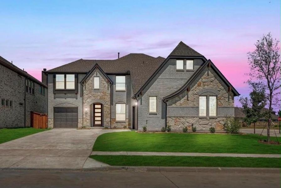 Front exterior of a new home in Willow Wood Classic 60, McKinney, TX, highlighting curb appeal (Image 2). Front exterior of a new home in Willow Wood Classic 60, McKinney, TX, highlighting curb appeal (Image 2).