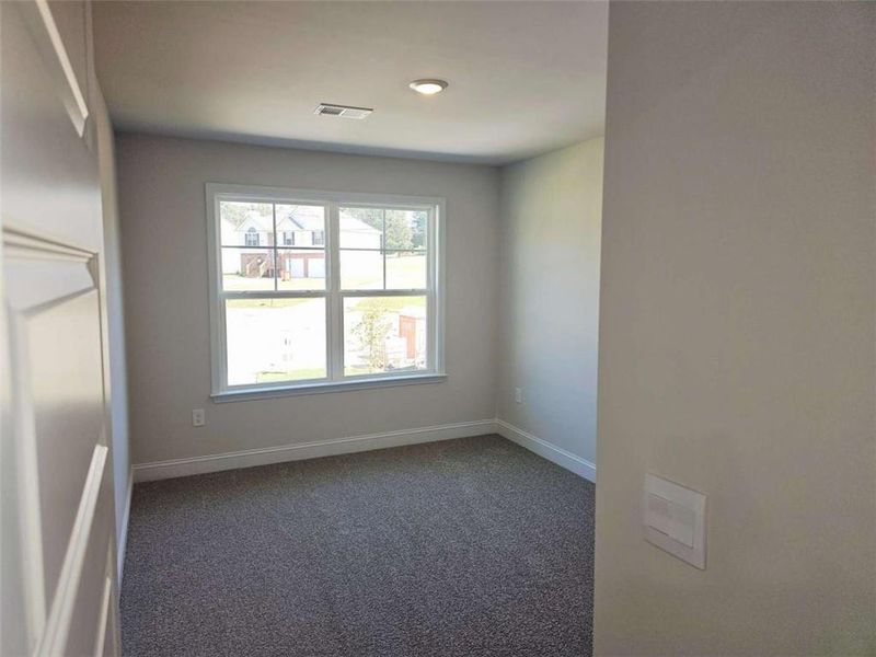 Spacious, unfurnished interior of a new home in Scarlett Place, Bowdon (Image 15).