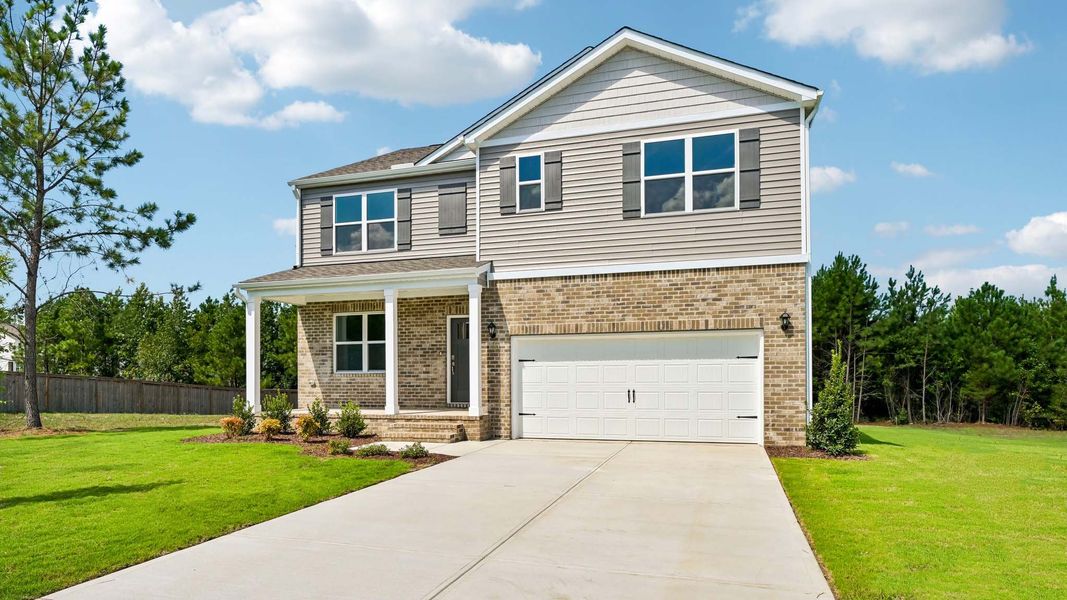 Representative exterior photo of a completed home built from the Hayden by D.R. Horton in Baker Farm, Youngsville, NC (Image 2). Representative exterior photo of a completed home built from the Hayden by D.R. Horton in Baker Farm, Youngsville, NC (Image 2).