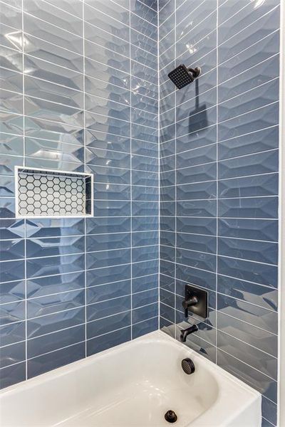 Full bathroom with shower / bath combination Full bathroom with shower / bath combination