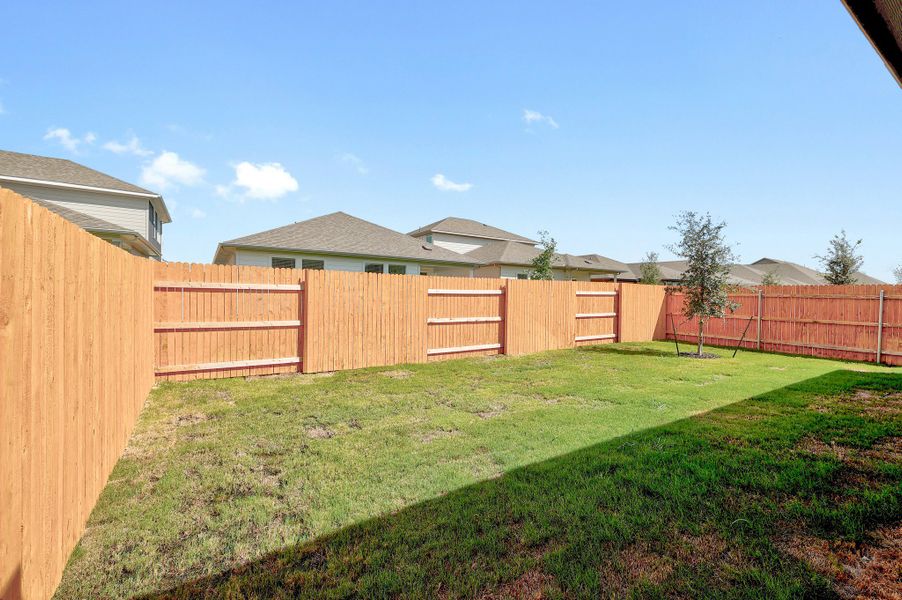 Exterior details and patio area of a home in Prairie Winds, Hutto (Image 4).