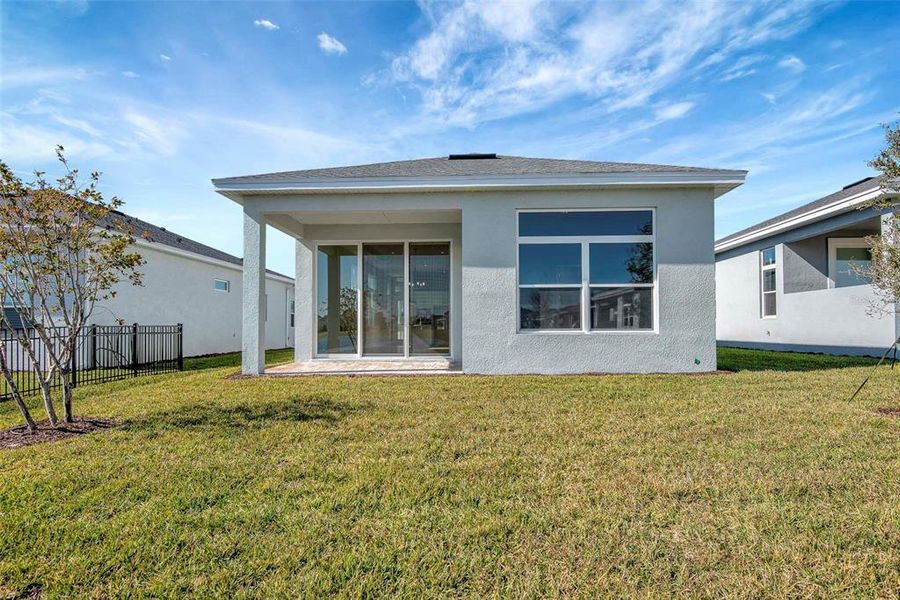 Exterior details and patio area of a home in The Reserve at Victoria, Deland (Image 3). Exterior details and patio area of a home in The Reserve at Victoria, Deland (Image 3).
