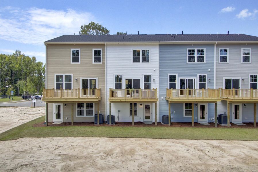 Exterior details and patio area of a home in , Johns Island (Image 26).