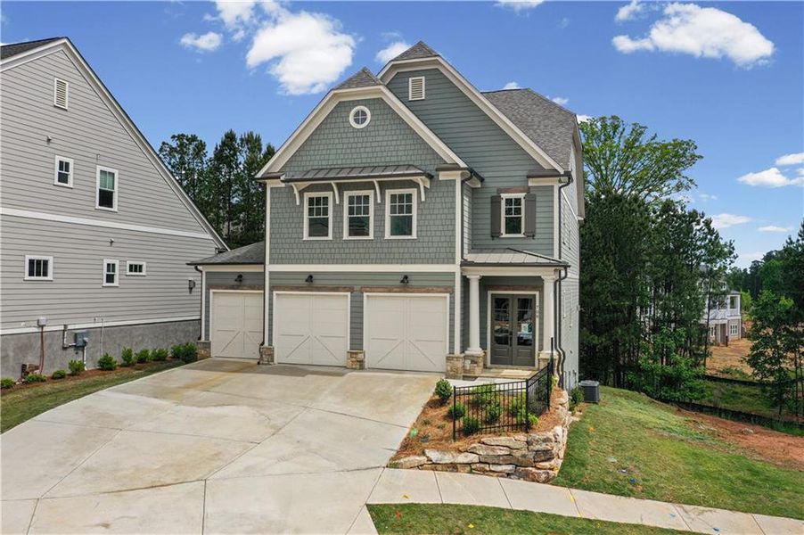 Front exterior of a new home in , Canton, GA, highlighting curb appeal (Image 1). Front exterior of a new home in , Canton, GA, highlighting curb appeal (Image 1).