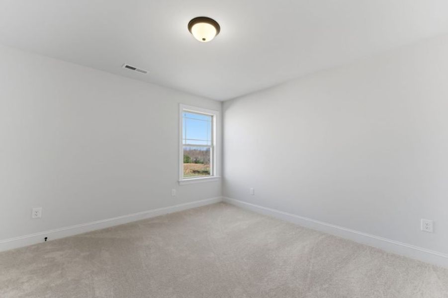 Spacious, unfurnished interior of a new home in Blacksmith, Stokesdale (Image 82).