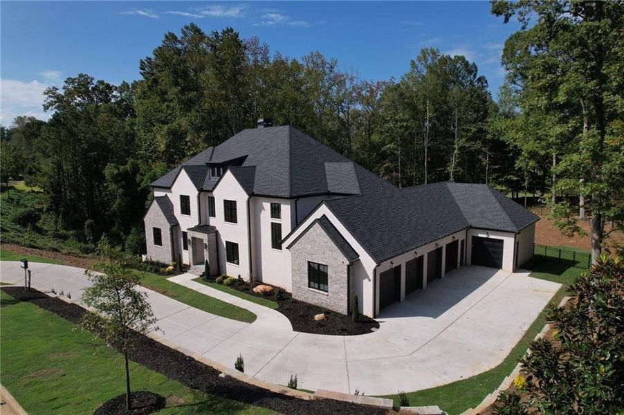 Front exterior of a new home in , Alpharetta, GA, highlighting curb appeal (Image 2).