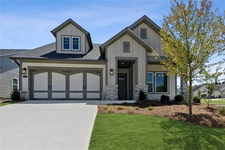 Front exterior of a new home in Crescent Pointe at Great Sky, Canton, GA, highlighting curb appeal (Image 1). Front exterior of a new home in Crescent Pointe at Great Sky, Canton, GA, highlighting curb appeal (Image 1).