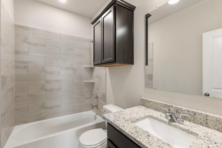 Representative furnished interior of a home built from the The 1613 by Stylecraft Builders in Arroyo Ranch, Seguin (Image 6).