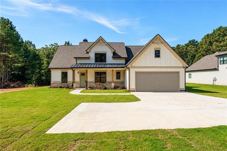 Front exterior of a new home in , Ellijay, GA, highlighting curb appeal (Image 28).