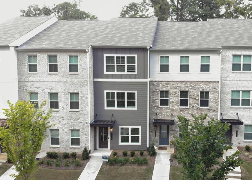 Front exterior of a new home in Magnolia Grove, Mableton, GA, highlighting curb appeal (Image 20).