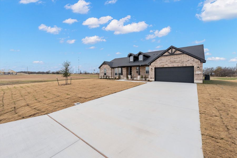 Front exterior of a new home in Fairview Meadows, New Fairview, TX, highlighting curb appeal (Image 26).