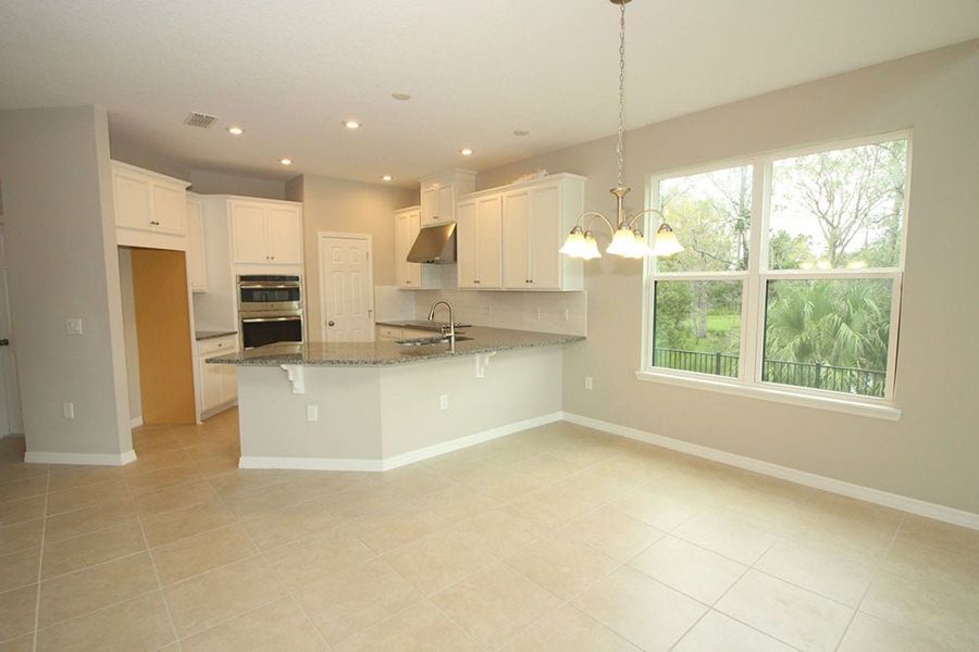 Representative furnished interior of a home built from the Santa Rosa by Taylor Morrison in Cassia at Skye Ranch, Sarasota (Image 10).