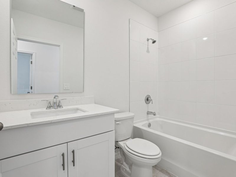 Furnished interior view inside a new home in Lake Deer Estates - Signature Series, Poinciana (Image 7).