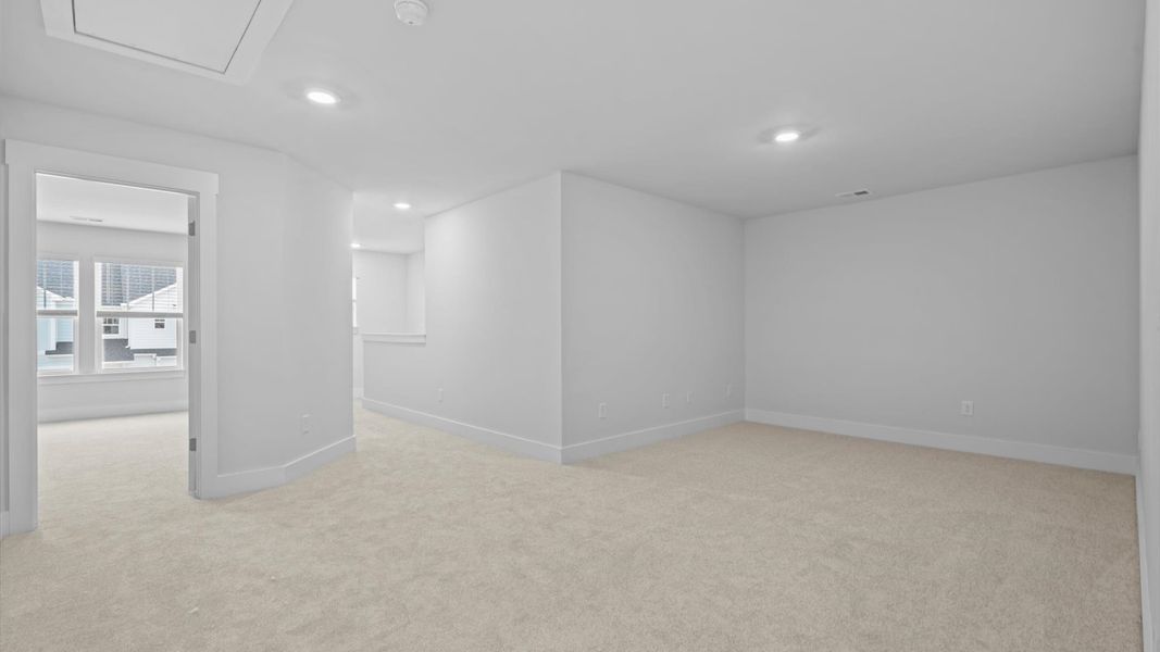 Notable carpeted loft designed with high standards and refined finishes