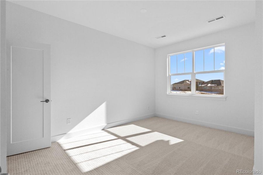 Spacious, unfurnished interior of a new home in Dillon Pointe - Journey, Broomfield (Image 33).