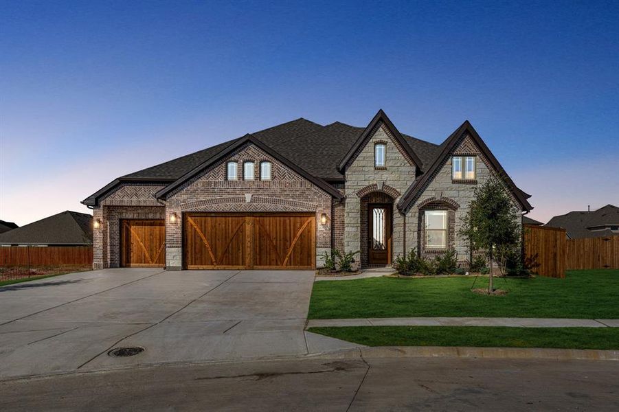 Front exterior of a new home in Stone River Glen 60s, Royse City, TX, highlighting curb appeal (Image 2).