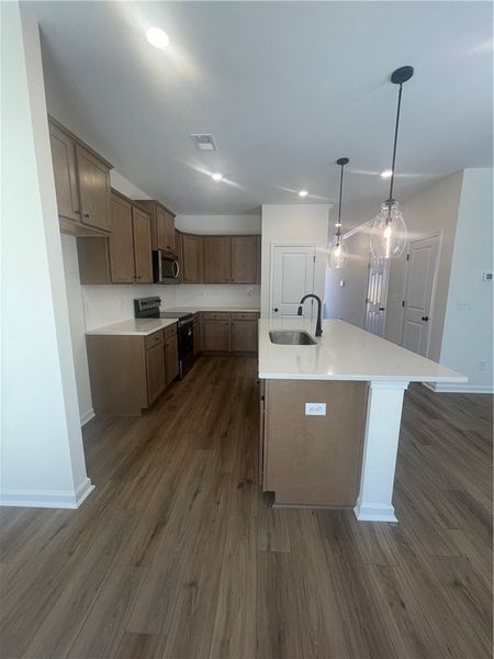 Furnished interior view inside a new home in Springwood Grove, Central (Image 4).